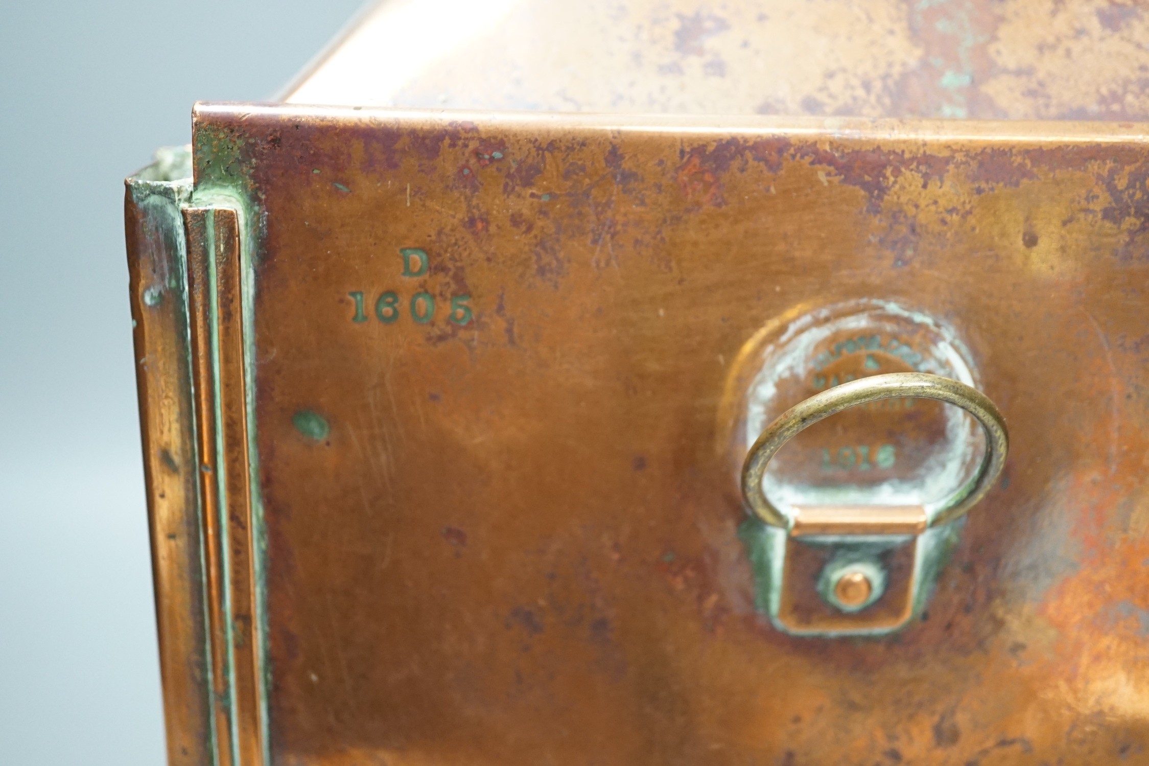 A copper ship’s port lamp, manufactured by Telford.Grier & Mackay, Glasgow, 1918, 42 cms high